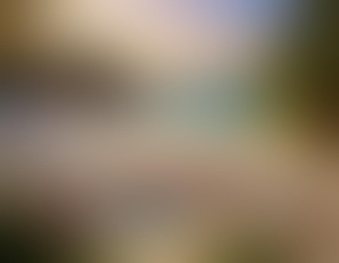 A serene beach scene with diverse nudist individuals joyfully engaging in activities like yoga and sunbathing, surrounded by lush greenery and calming ocean waves. The sun sets in the background casting warm, golden light, symbolizing self-acceptance and freedom. Soft textures of sand and water contrast with the vibrant colors of beach accessories and nature. super-realistic. vibrant colors. peaceful ambiance.